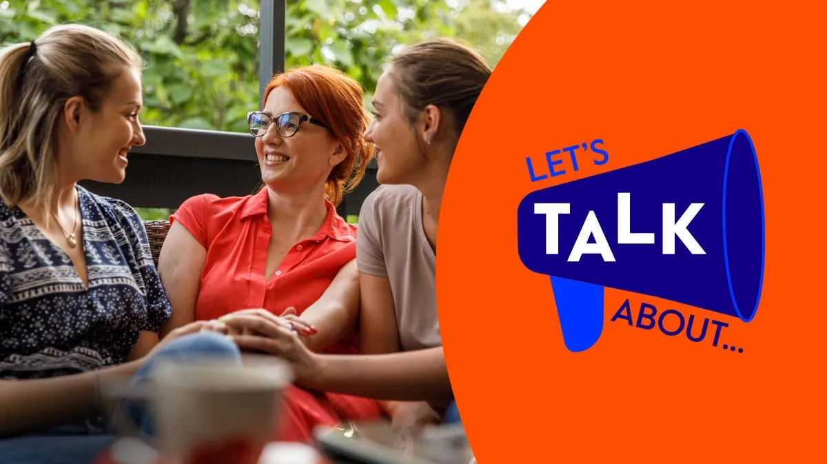 Three women laughing