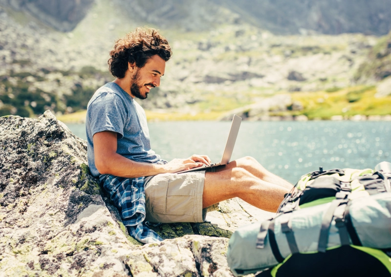 An expat working on a laptop