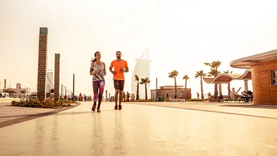 A couple doing outdoor exercise together